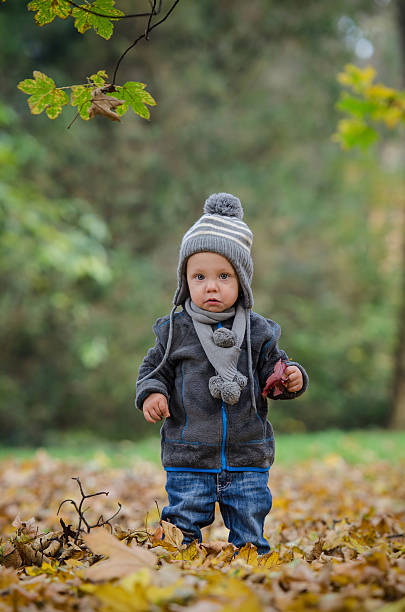 istock Baby in autumn forest 471977253