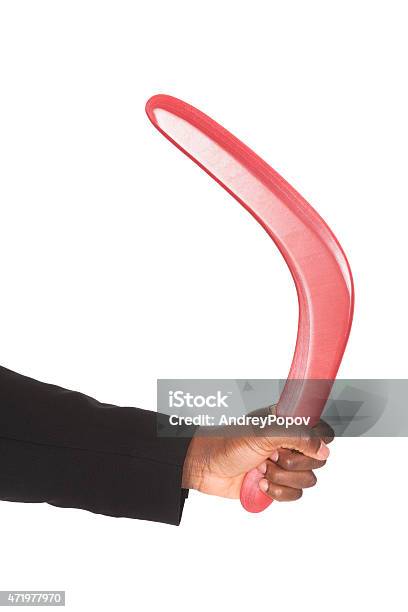 Maschio Donna Mano Holding Boomerang - Fotografie stock e altre immagini di Boomerang - Boomerang, Lanciare, Tenere