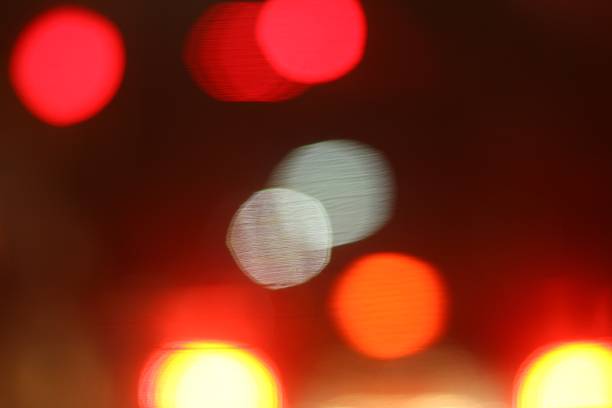 istock Blurred of car in city at night 471978224