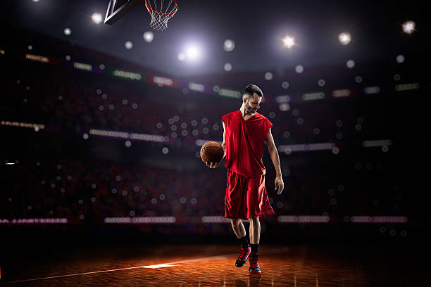 istock red Basketball player in action 471980366