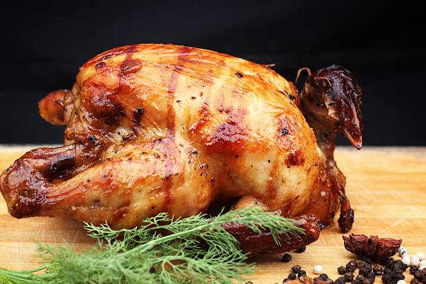 istock Whole roasted chicken with fresh vegetables 471981971