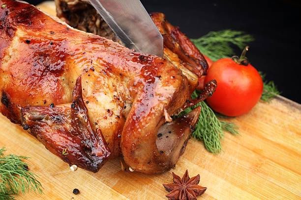 istock Whole roasted chicken with fresh vegetables 471982093