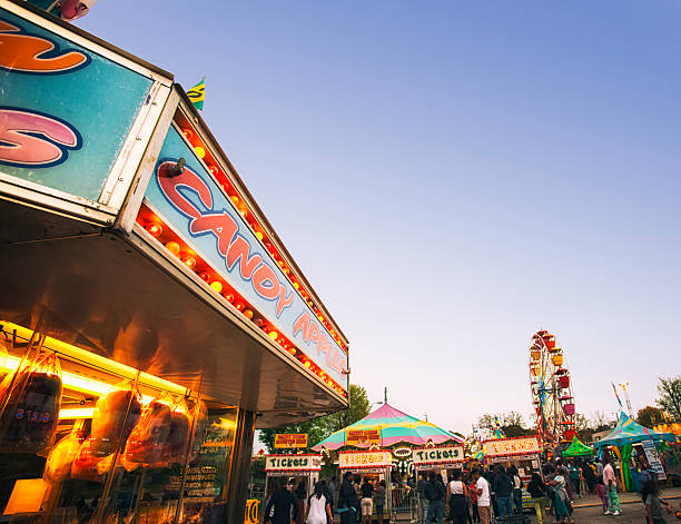 istock cotton candy and carnival rides 471983604