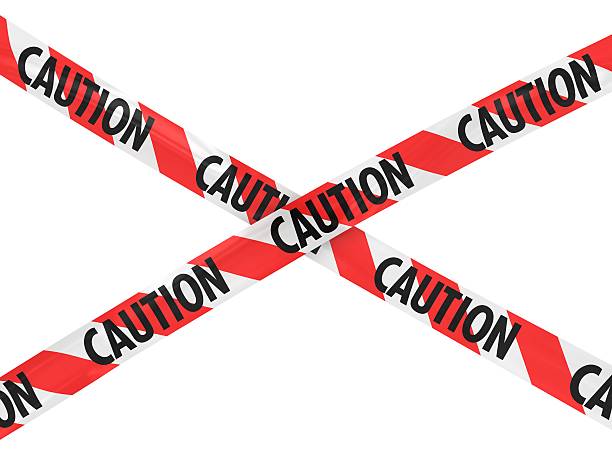 istock Red and White Striped CAUTION Barricade Tape 471983742