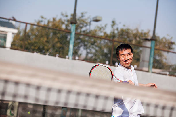 istock Adult men playing tennis 471984743