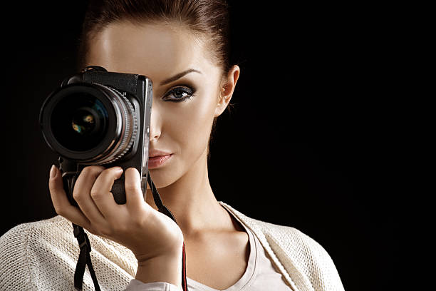 istock sexy photographer capturing a picture 471984784