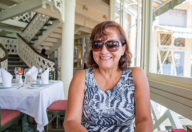 istock Mature smiling hispanic woman portrait 471986132