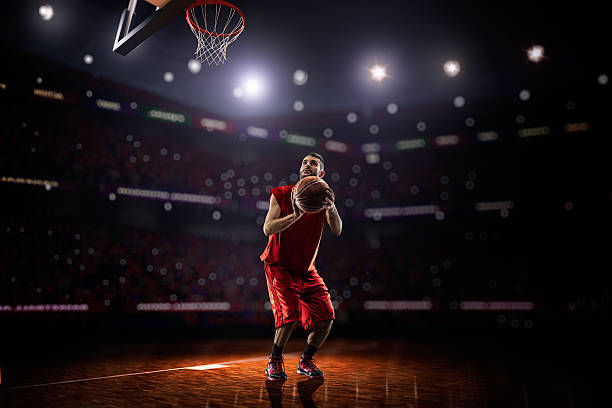 istock red Basketball player in action 471989230