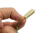 finger-halten-ein-fiberoptik-verbindung-mit-faser-kabel.jpg?b=1&s=170x170&k=20&c=n_cPJmWBl3slKc2oDA438fXQNu4nAnylWQ8a4uvaL78=