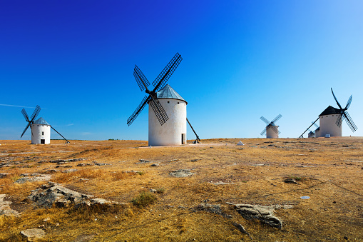 Group of windmills in Campo de Criptana in summer. La Mancha, Spain