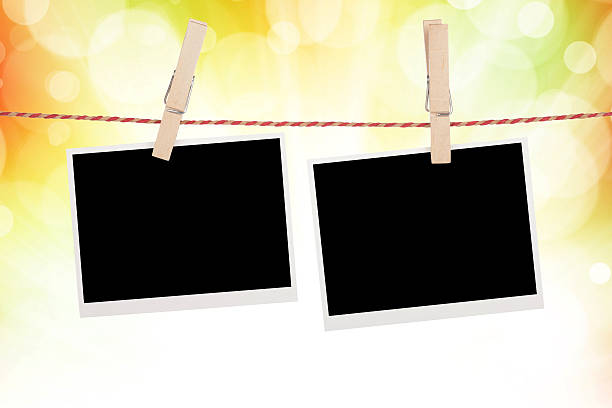 istock Blank photos hanging on clothesline 471989921