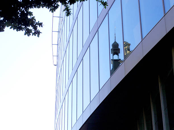 istock church reflection on mirror, reflective exterior of modern archi 471990138