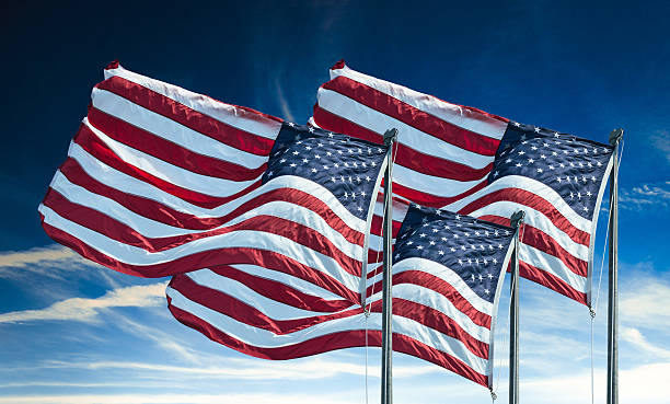 istock american flags waving for a national holiday 471991276