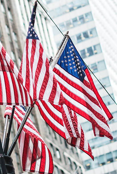 istock american flags waving for a national holiday 471991290