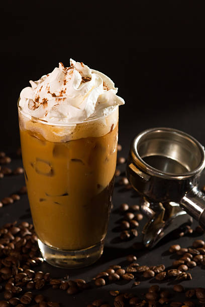 istock ice coffee and coffee bean as black background 471993880