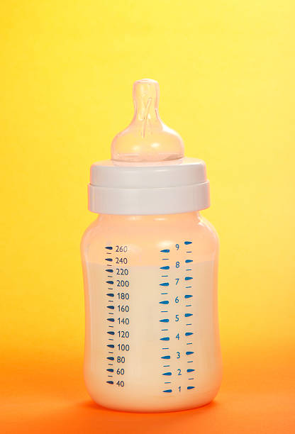 istock Small bottle for feeding of child 471994061