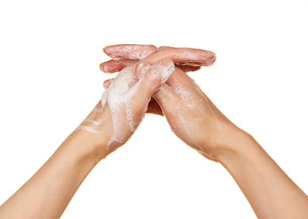 istock Foam of soap and female hands 471995017