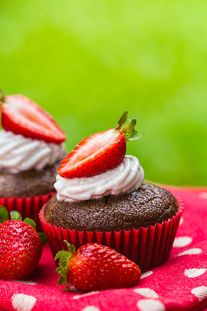 Paleo coconut chocolate cupcakes with strawberries