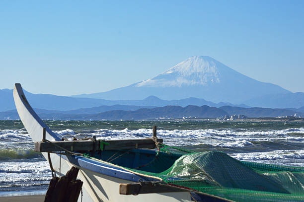 Mt. Fuji and a fishing boat.