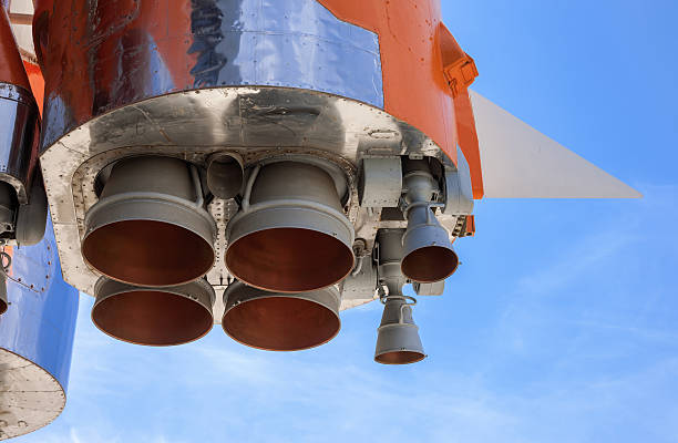 istock Details of space rocket engine over blue sky background 471997363