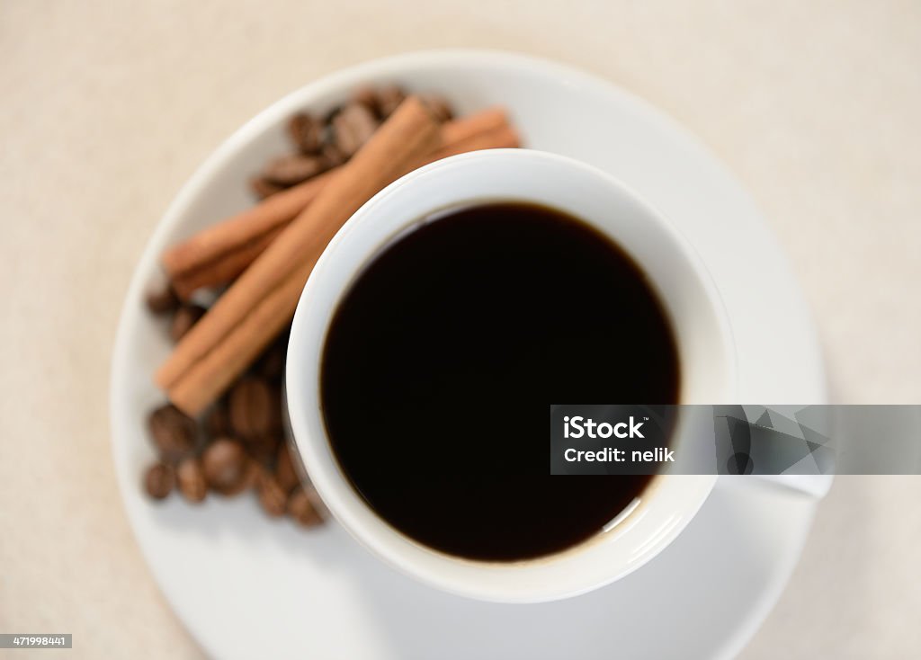 Cup of coffee with cinnamon Cup of coffee with cinnamon sticks Africa Stock Photo