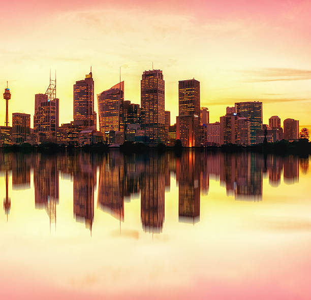 istock Warmed toned sunset illuminating Sydney, Australia skyline 471999251