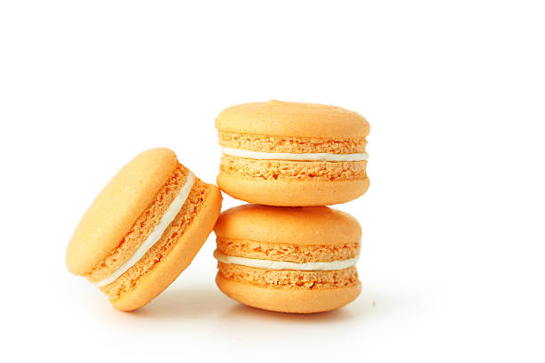 istock French orange macarons isolated on white 472001964