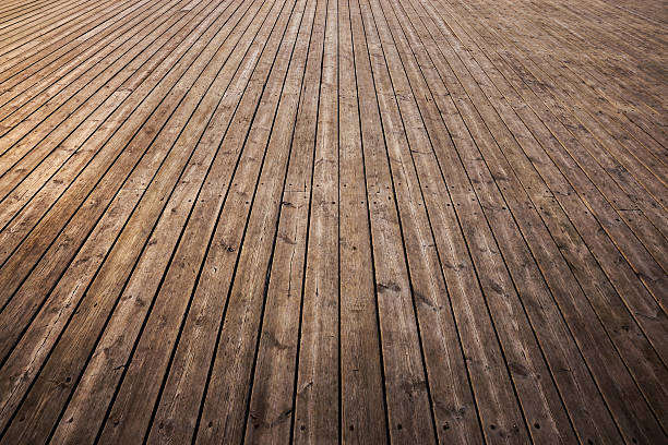 Strips of old wooden floor in need of a good shine stock photo
