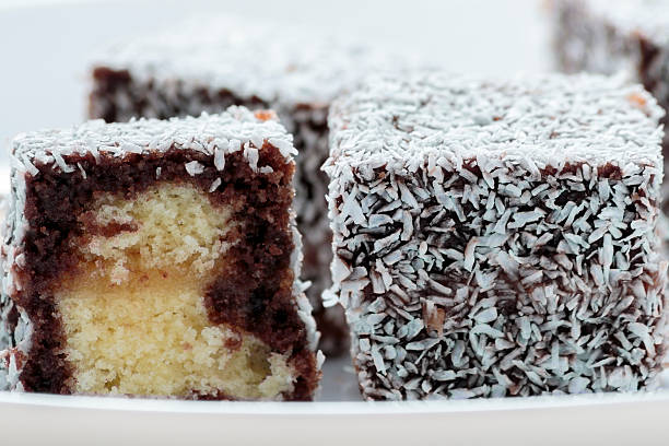 istock Australian Lamington cake on white plate 472002754