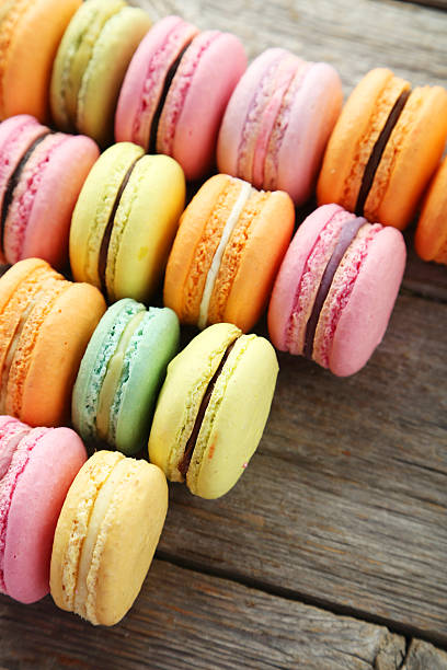 istock French colorful macarons on grey wooden background 472003172