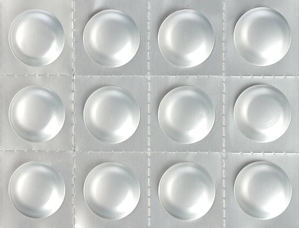 medical fundo de pilha de bolha pílulas em pacotes - painkiller vitamin pill full frame macro - fotografias e filmes do acervo