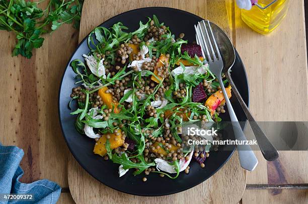 A Delicious Platter Of Chicken Lentil And Squash Medley Stock Photo - Download Image Now