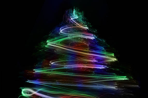 istock Abstract Christmas tree : Painting using the multicolored optical fiber 472009961