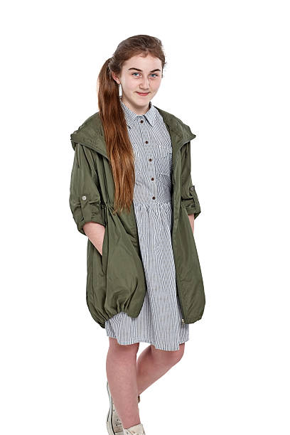 istock Pretty young girl posing confidently in studio 472010948