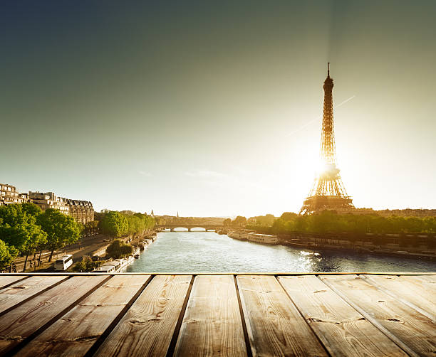 istock background with wooden deck table and  Eiffel tower in Paris 472012335