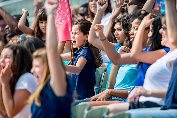 istock Football or Baseball Fans at Event 472014065