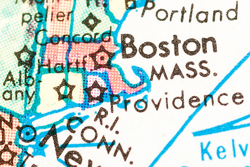Studying Geography - Photograph of Massachusetts and Surrounding States on retro globe. 