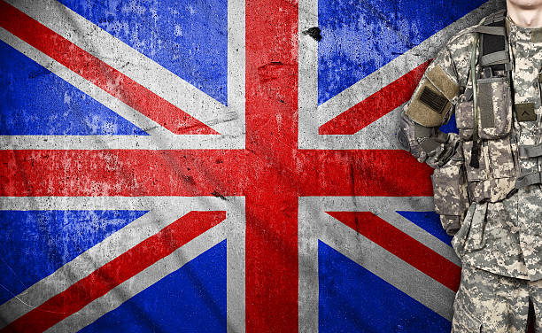 istock American soldier with UK flag 472014816