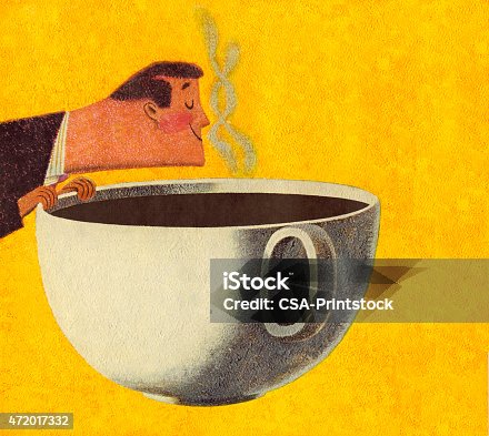 istock Man Smelling Giant Cup of Coffee 472017332