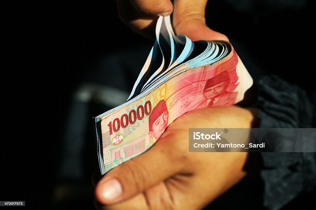Counting Counting money Indonesian Currency Stock Photo