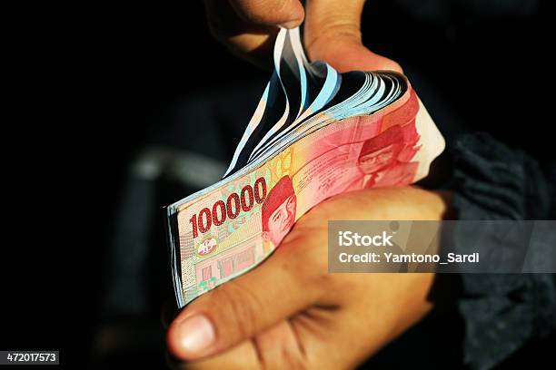 Counting Stock Photo - Download Image Now - Indonesian Currency, Indonesia, Indonesian Culture
