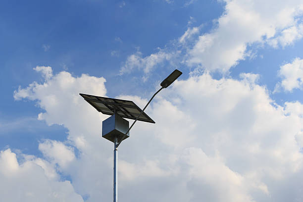 Closeup of Solar panel on electric pole for lightning Closeup of Solar panel on electric pole, use of Solar energy for lightning of highway, Rio de Janeiro, Brazil concentrated solar power photos stock pictures, royalty-free photos & images