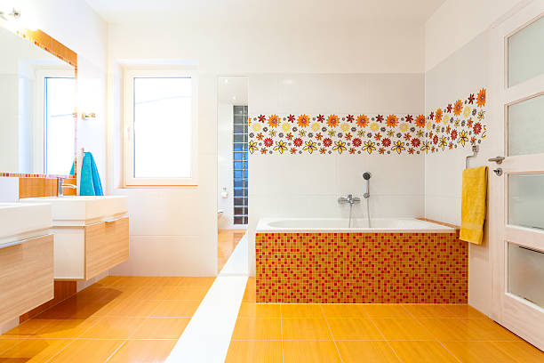 New contemporary bathroom with orange tiles