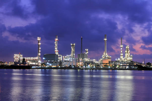 istock Oil refinery near the river. 472019495