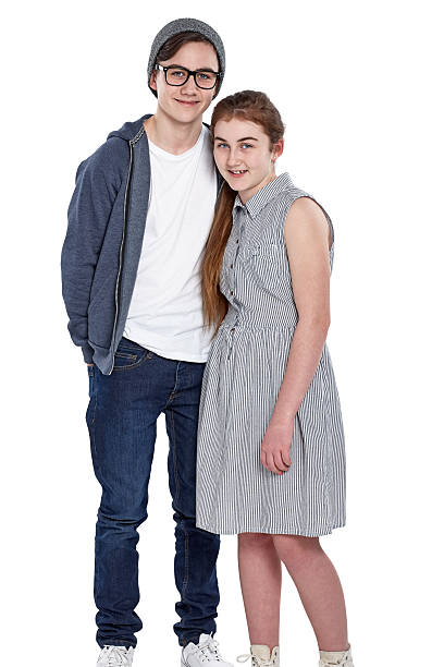 istock Brother and sister posing on white 472021446
