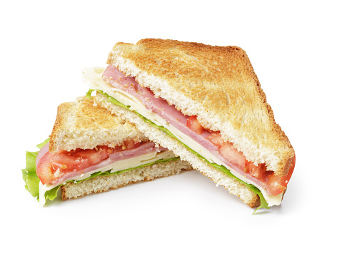 toasted sandwich with ham, cheese and vegetables, isolated