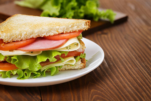 istock toasted sandwich with ham, cheese and vegetables 472025511