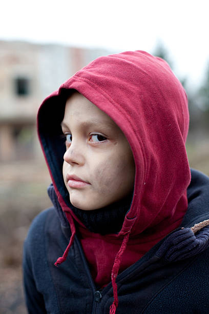 istock portrait of a homeless boy 472028037