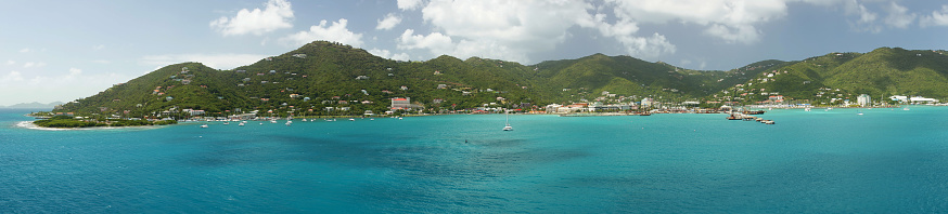 Road Town, located on Tortola, is the capital of the British Virgin Islands. It is situated on the horseshoe-shaped Road Harbour in the centre of the island's south coast.