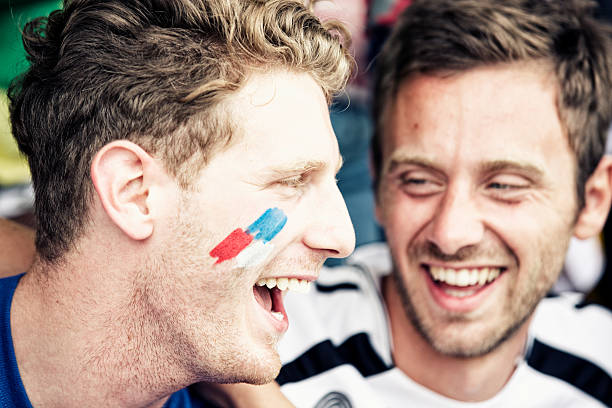 istock Sports fans cheering a game 472028945